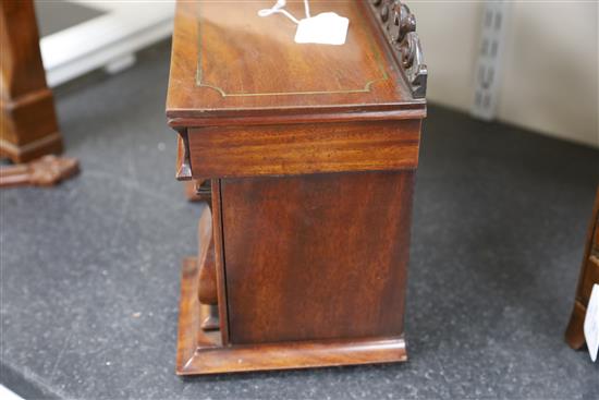 An early Victorian mahogany novelty tea caddy in the form of a twin pedestal sideboard, 15.75in. height 11in.